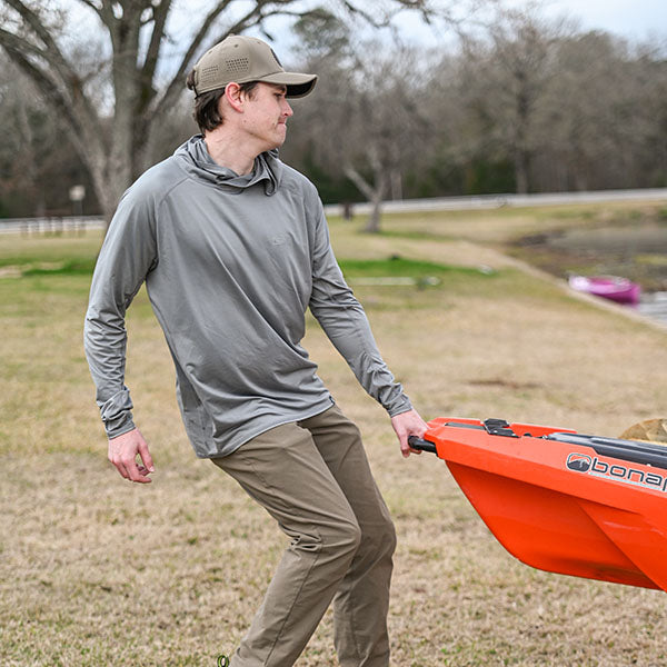 Performance Hoodie in Mens  Stone pulling a kayak